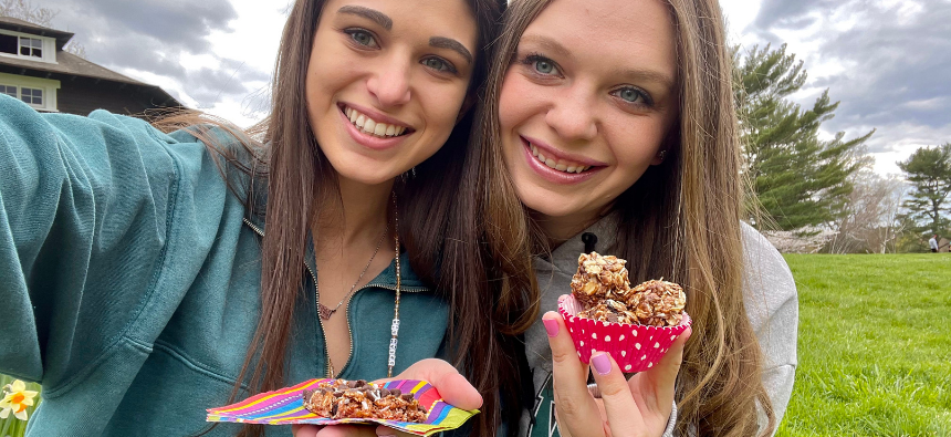 Sarah and Brooke smiling with granola