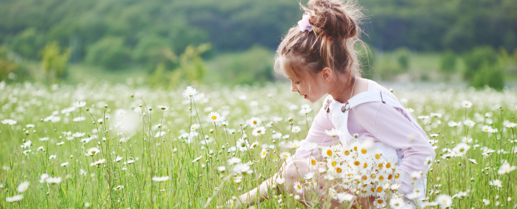 Girl in field of flowers