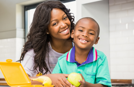 Mom and son smiling