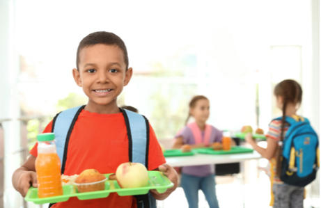 Child with his lunch at school