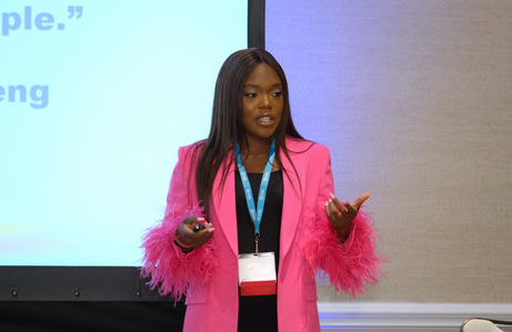 Woman Speaking at Summit