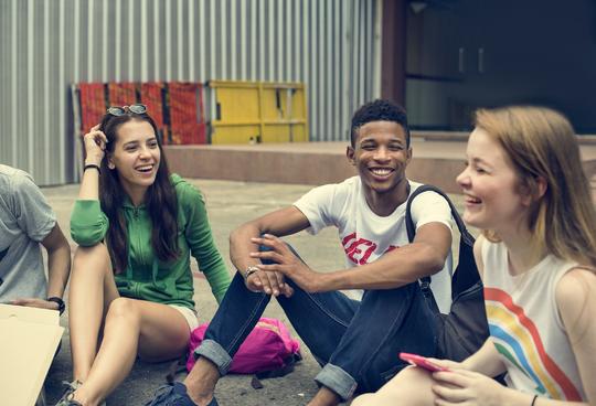 College Students Sitting Outside