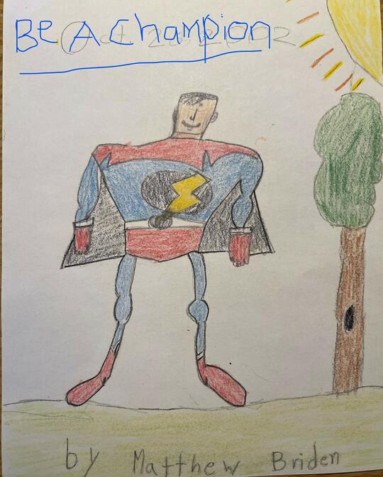 Matthew drawing of a super hero that reads "Be a Champion"