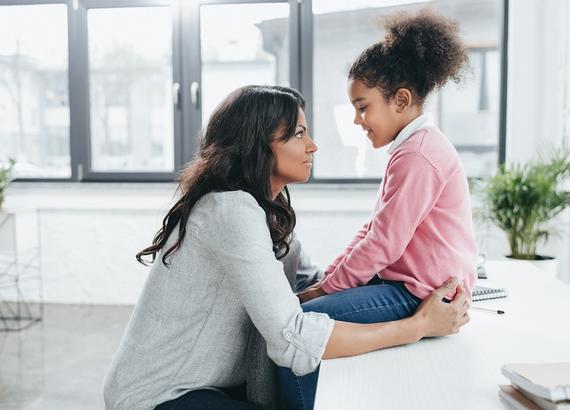 Mother talking to daughter