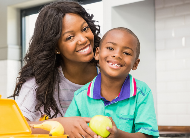 Mom and son smiling