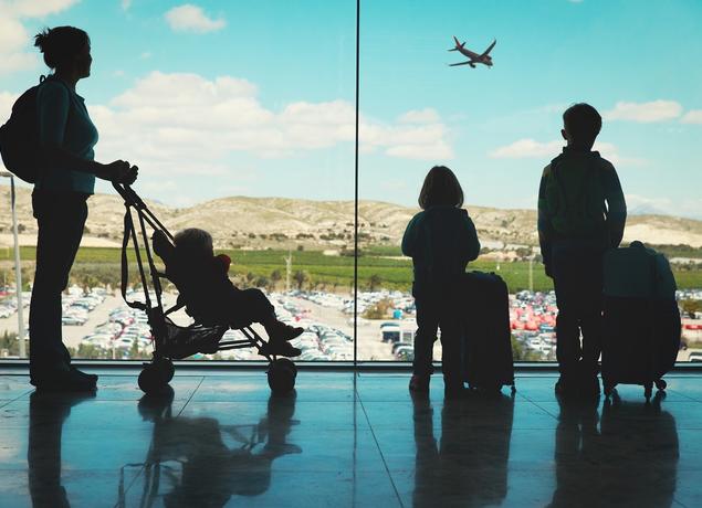 Family at airport traveling