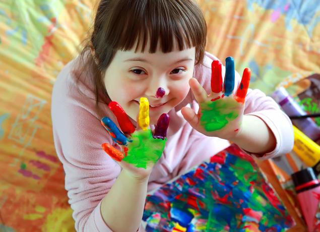 Girl with paint on hands