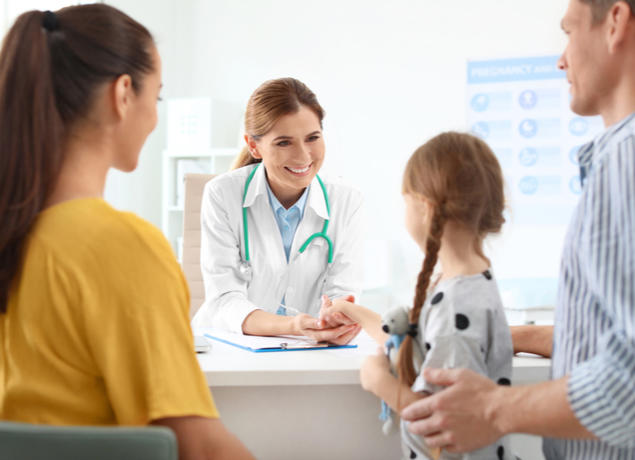 Parents talking to doctor