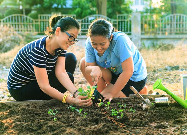 Mom and Daughter gardening
