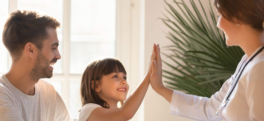 kid high-five doctor