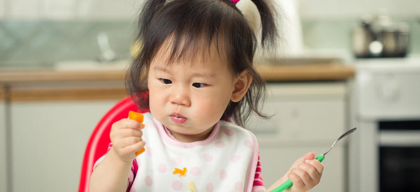 child eating food