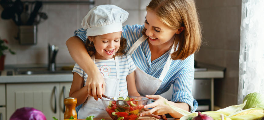 Mom and daughter cooking