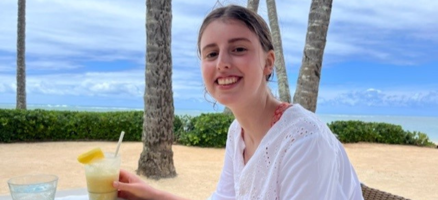 Kealani Nickles eating at beach